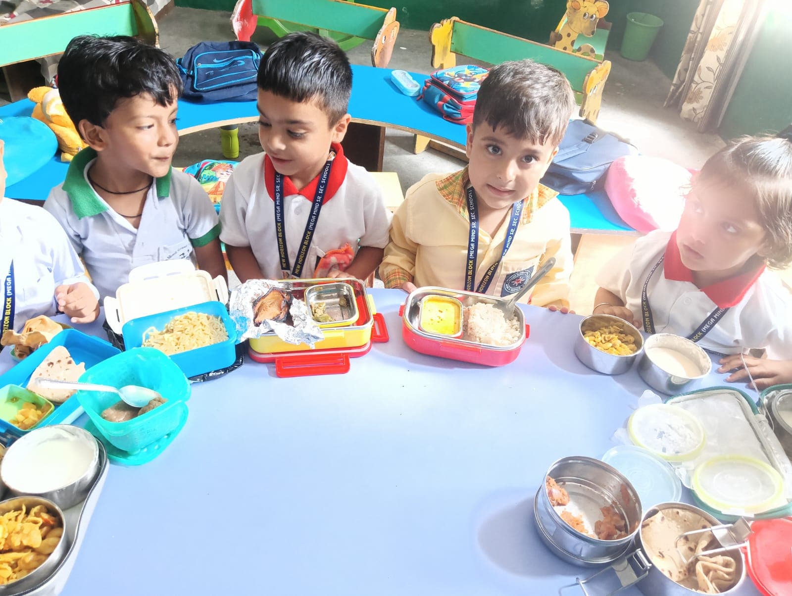 Tiffin Time. Little ones, full plates, big smiles